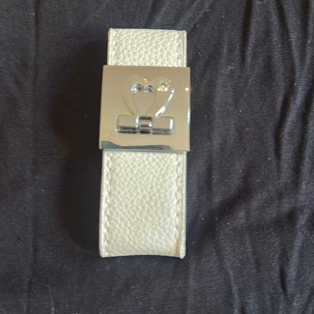 Heart opening bracelet  leather (synthetic)?